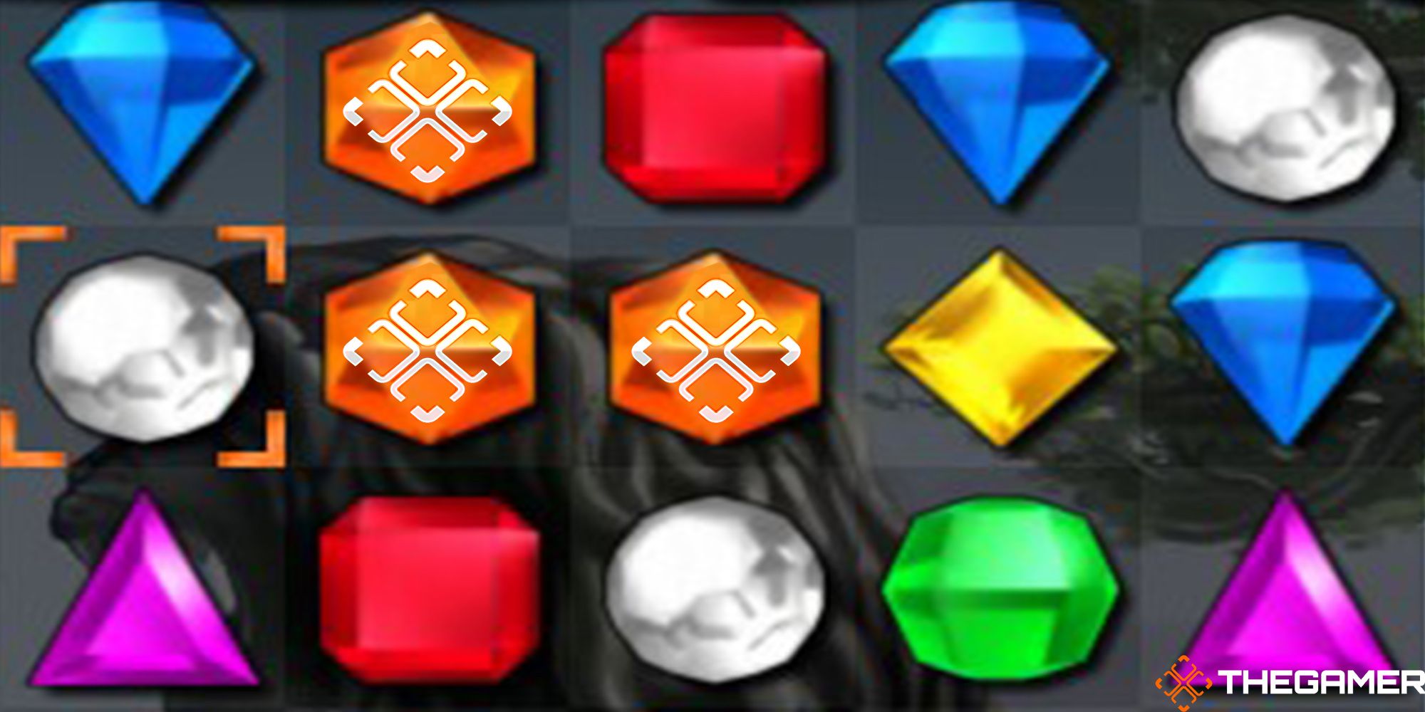 A close-up screen shot of Bejeweled with thegamer's icon embedded on the orange gems. Custom Image for TG.