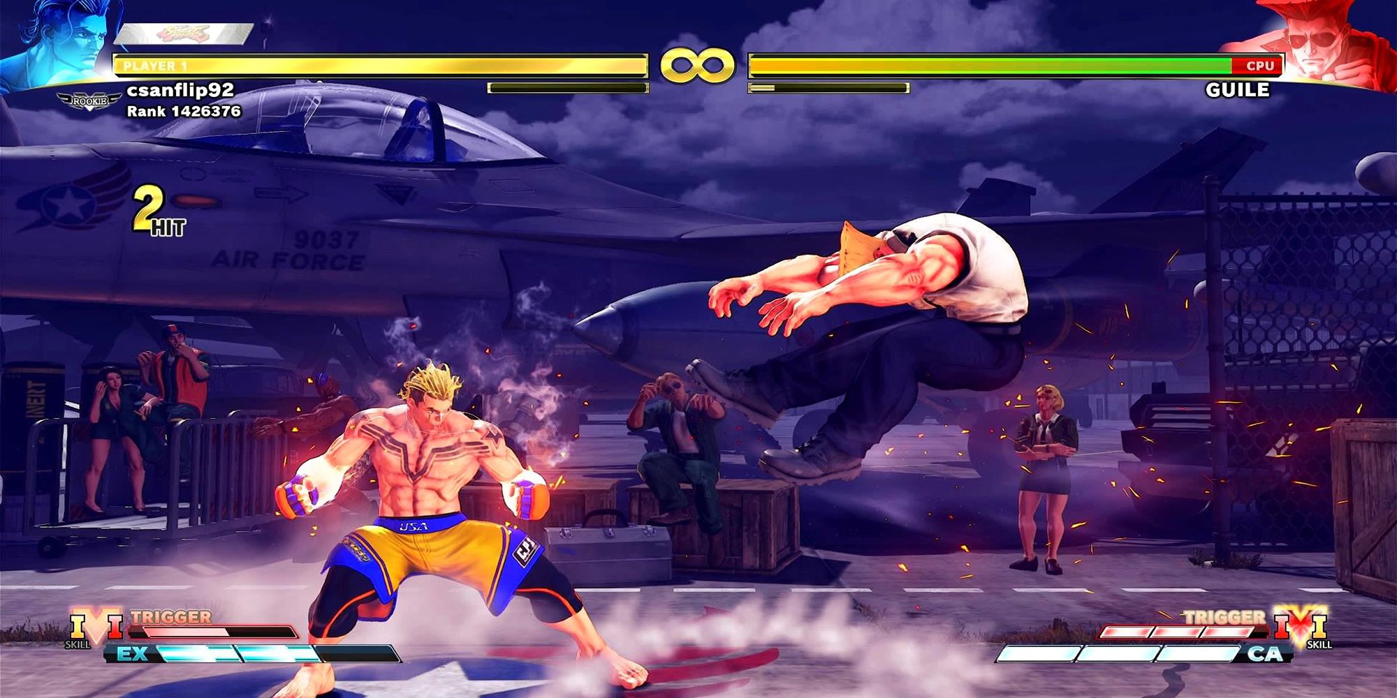 Luke hits Guile with his Thermobaric Thrash in a battle at the air field in Street Fighter 5: Champion Edition.