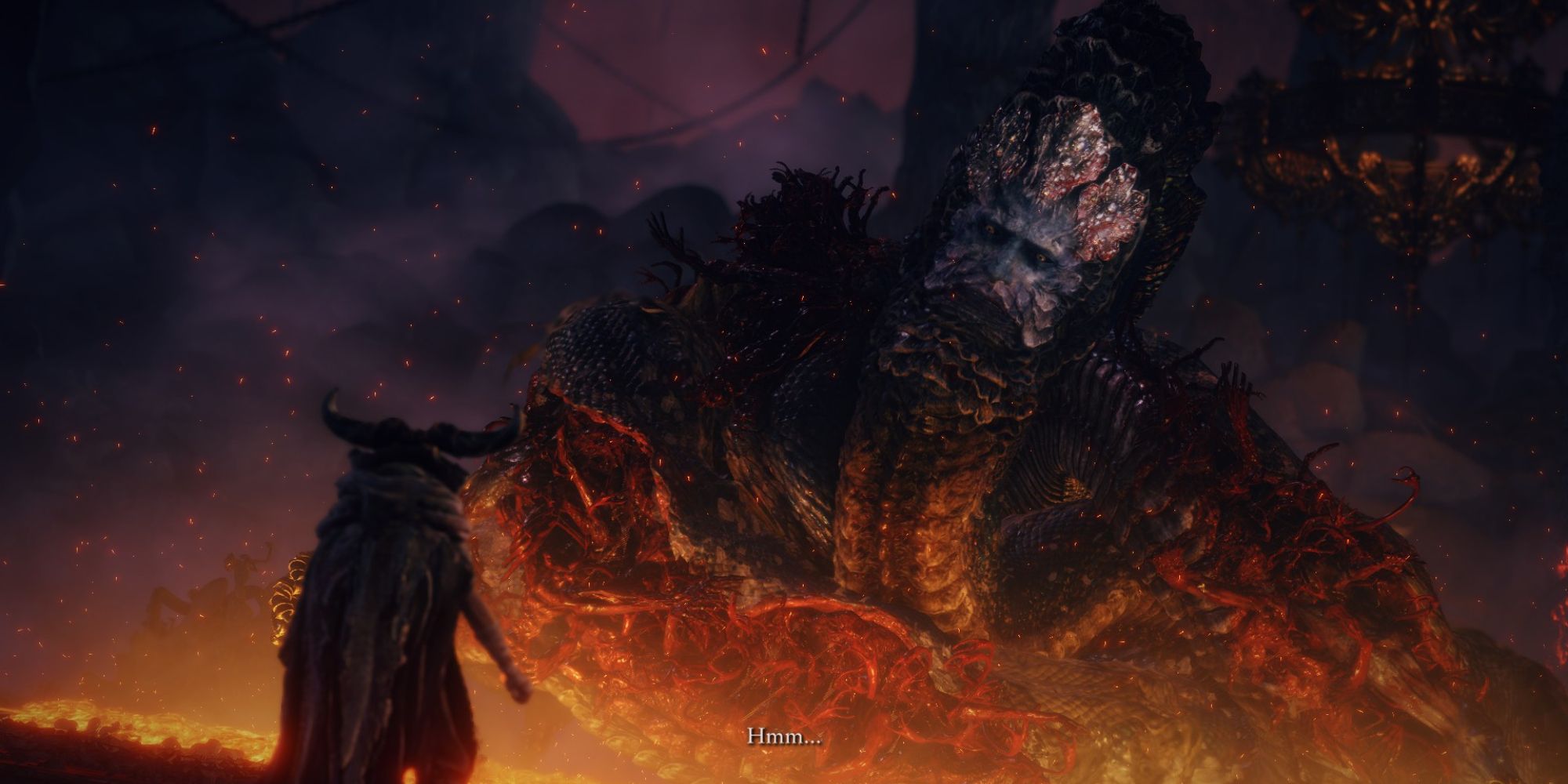 The player confronting the rykard serpent boss in Elden Ring, who's rising from a fiery depth.