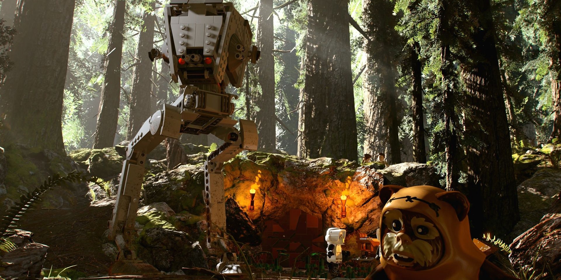 A screenshot showing an AT-AT and an Ewok in the forests of Endor in LEGO Star Wars: The Skywalker Saga