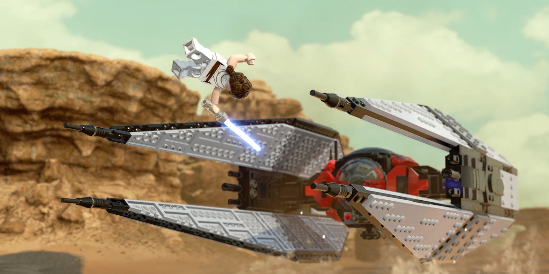 A screenshot showing Rey attacking Kylo Ren's TIE Fighter in LEGO Star Wars: The Skywalker Saga