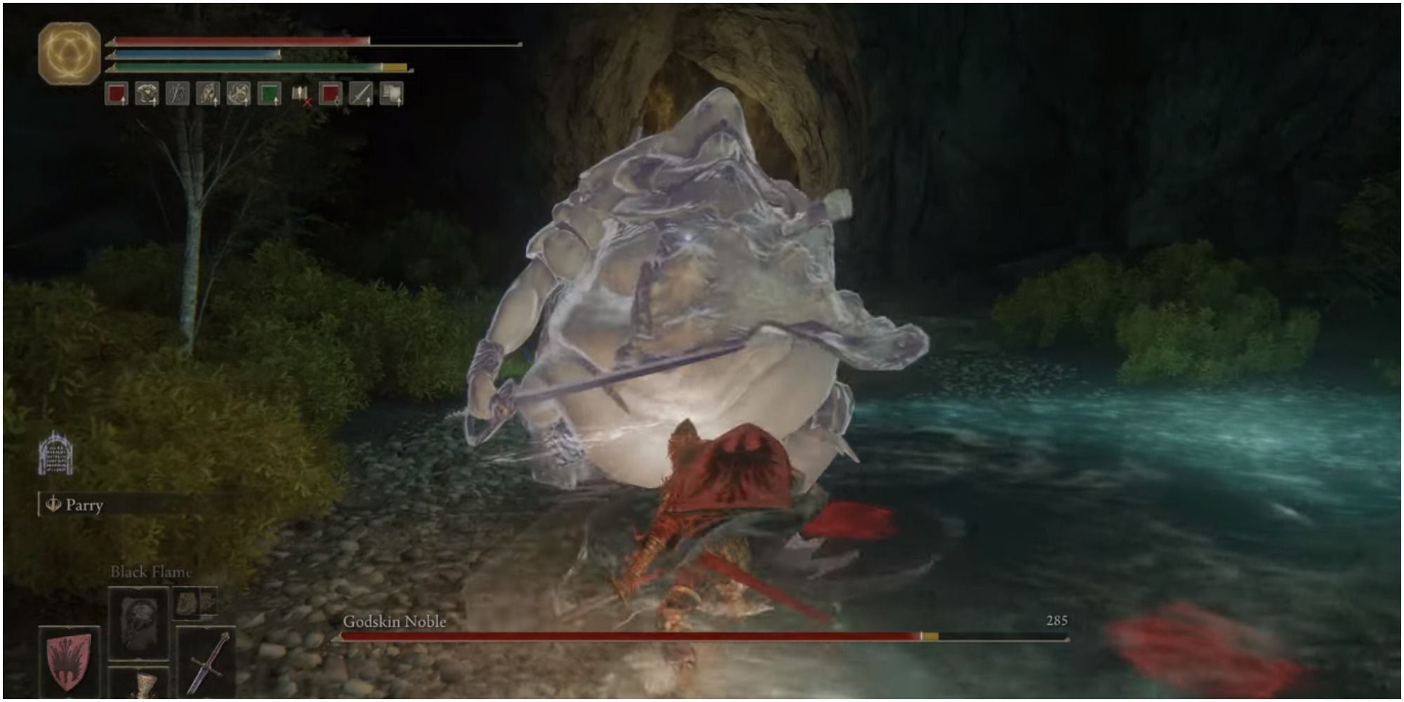 The player attacking the boss with a melee weapon.