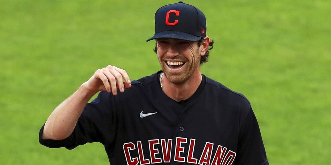 shane bieber smiling on the field