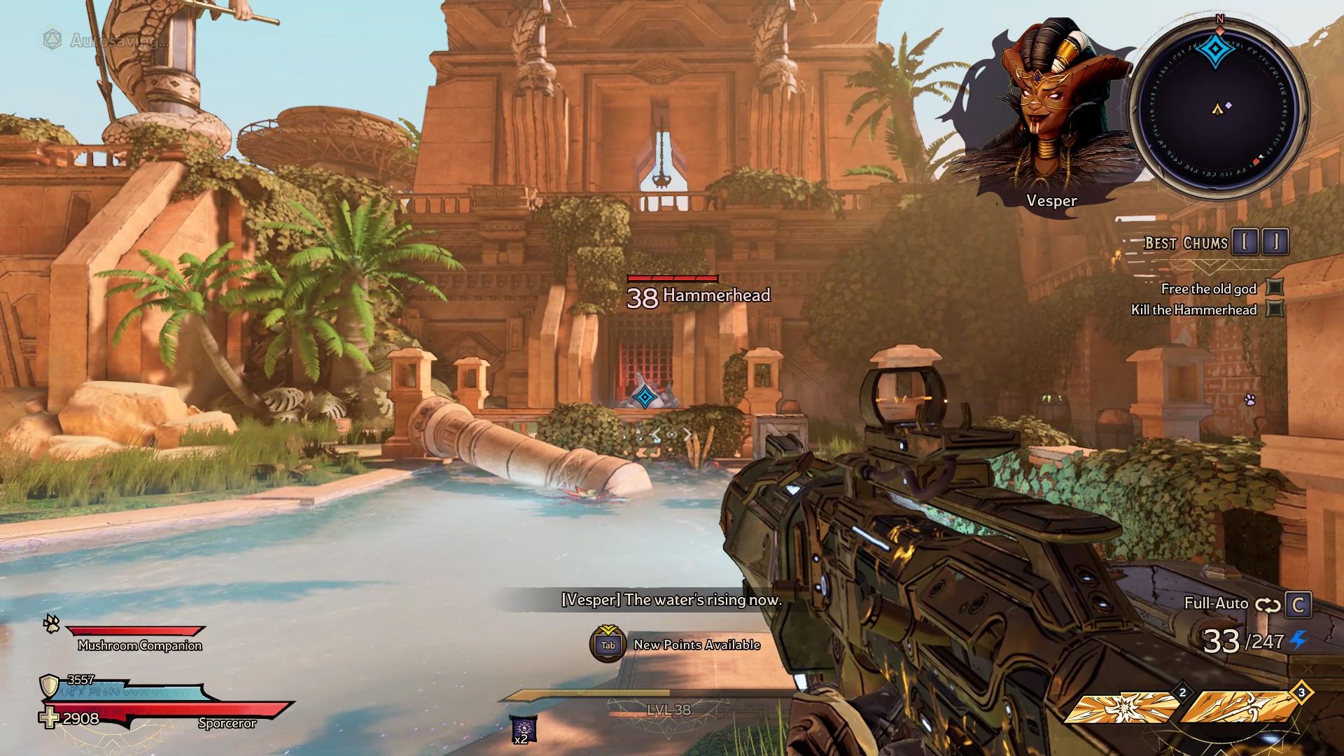 A player aims at a Hammerhead enemy in a desert oasis area filled with ruins
