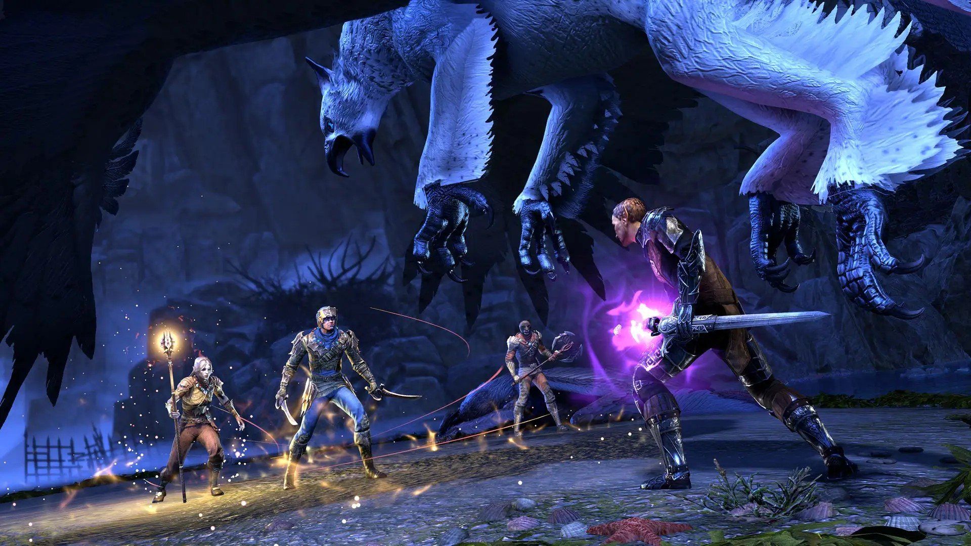 Adventurers fighting mages in an underground cavern in ESO