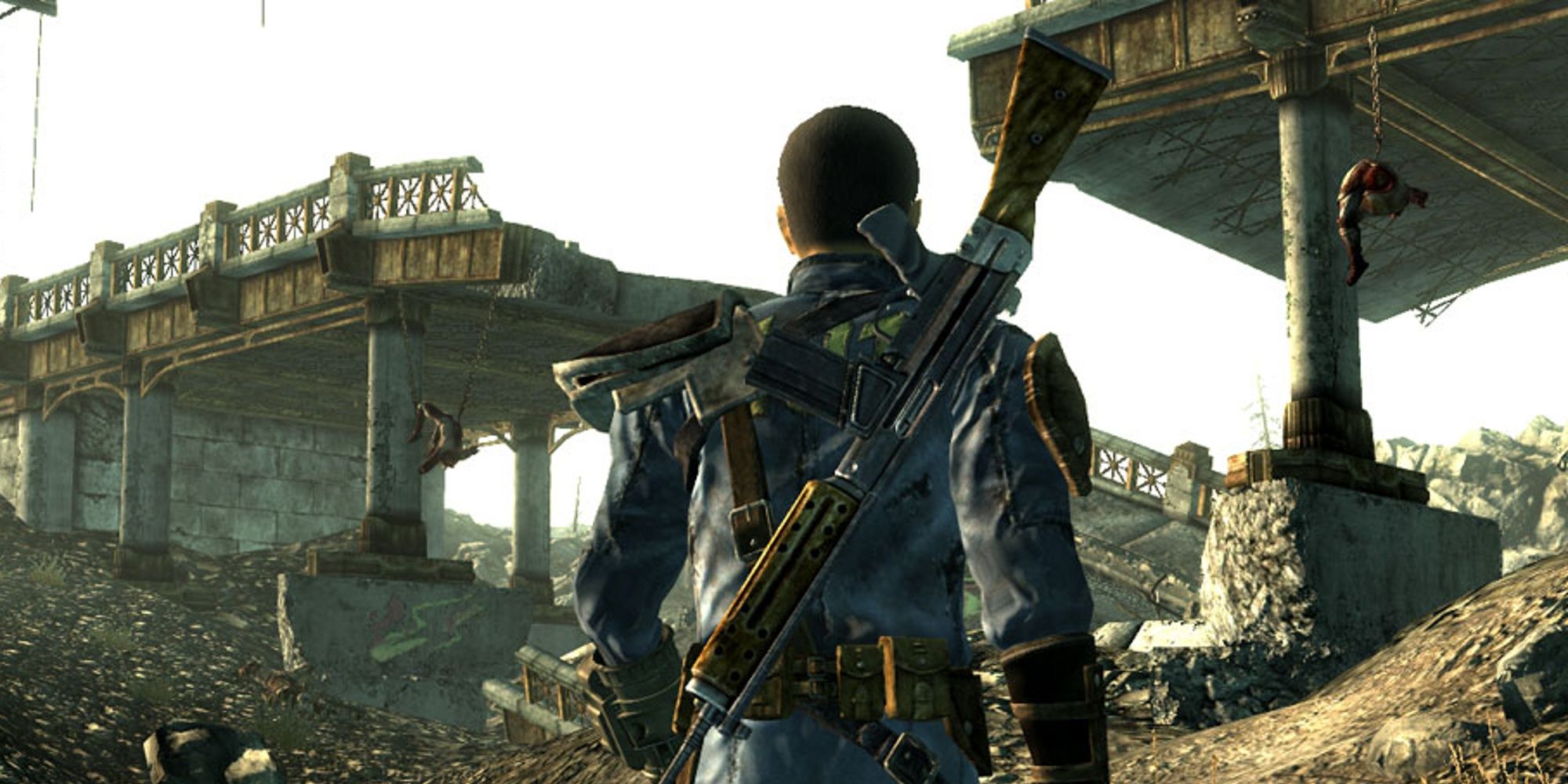 Vault Dweller standing before broken bridge in Fallout 3