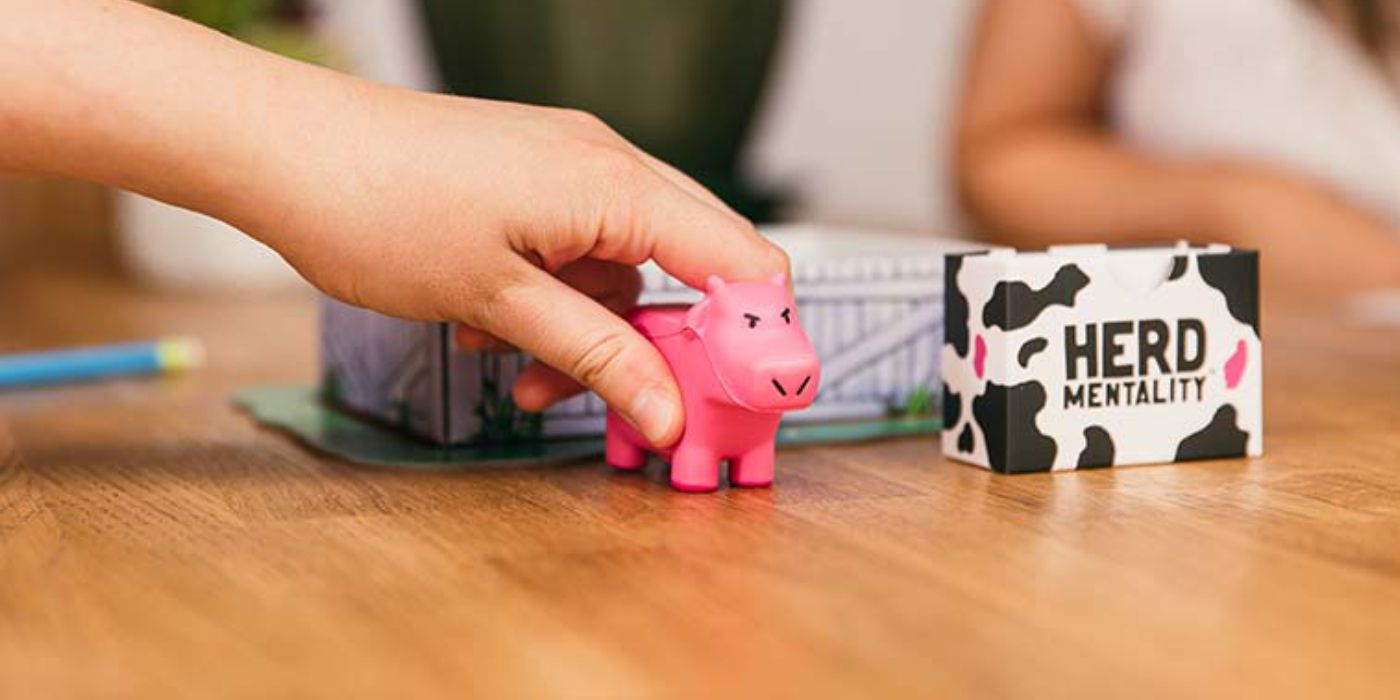Herd mentality cards and squishy cow token