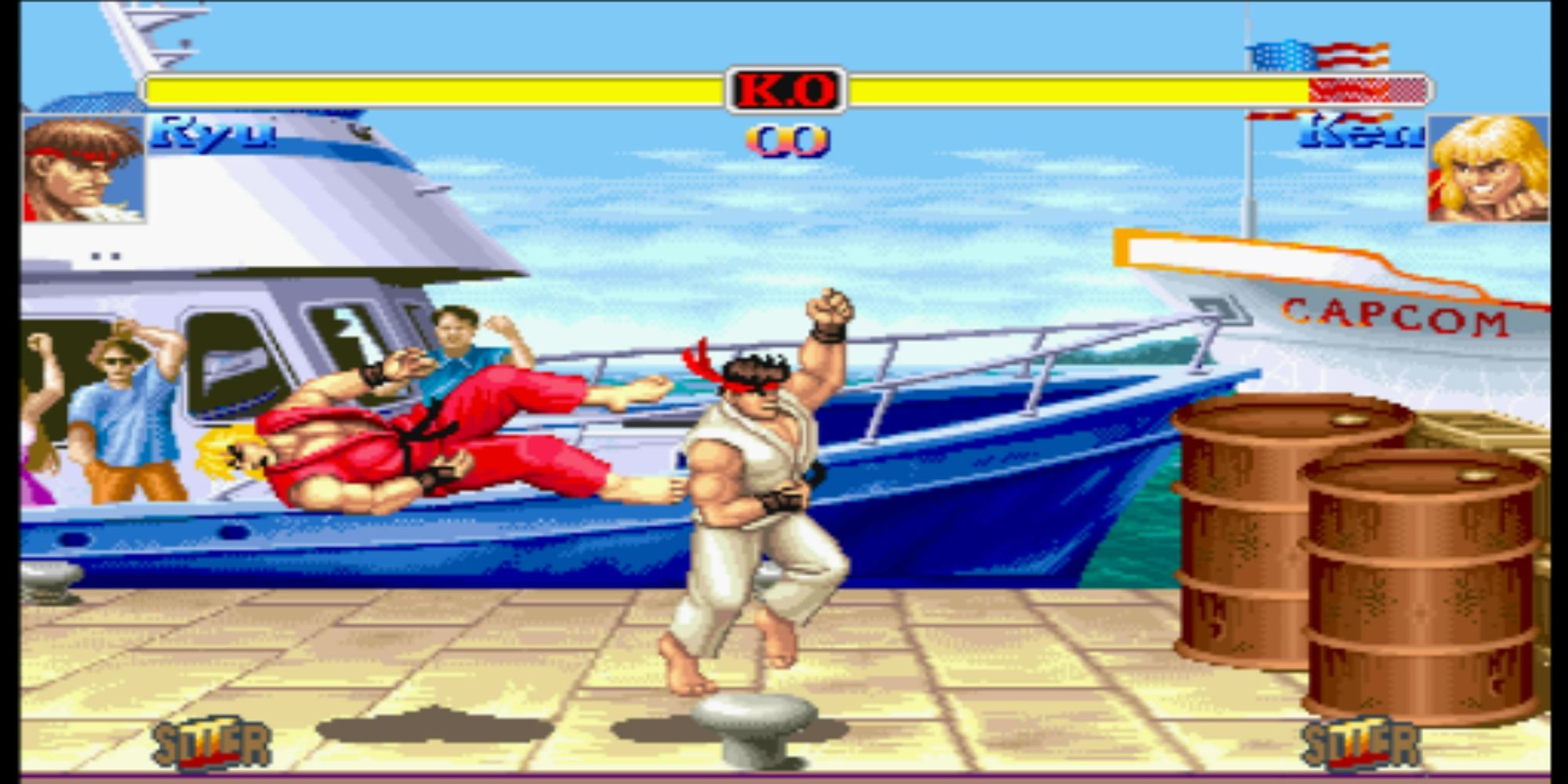 Super SF2 Ryu hits Ken with a Shoryuken on a dock in the US in Hyper Street Fighter 2.