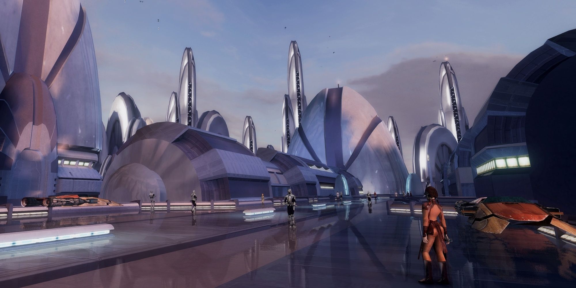 The cityscape of Taris from Star Wars KOTOR with Bastila in the foreground, and a Sith guard in the distance.
