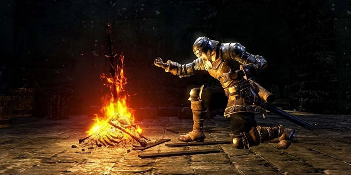 The Chosen Undead kneeling at a Bonfire in Dark Souls
