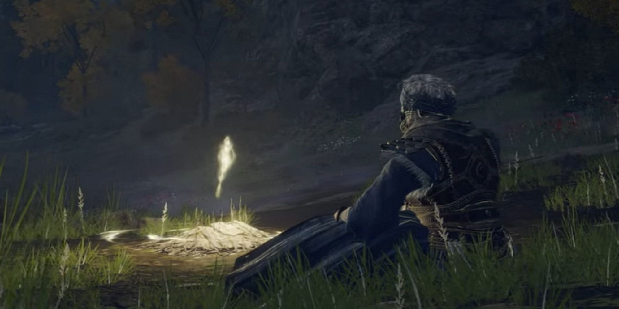 The player sits by a Site of Grace in Elden Ring