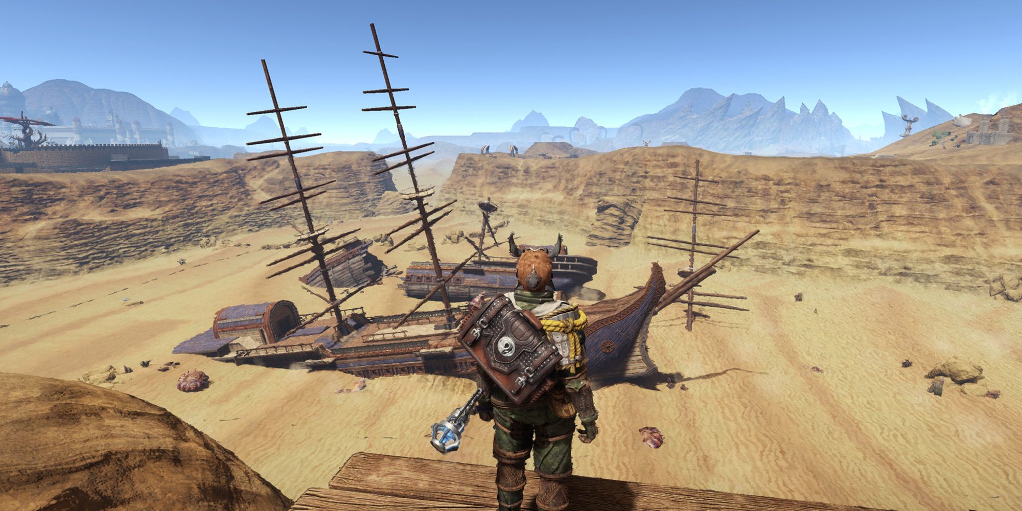 player standing in desert looking at ship