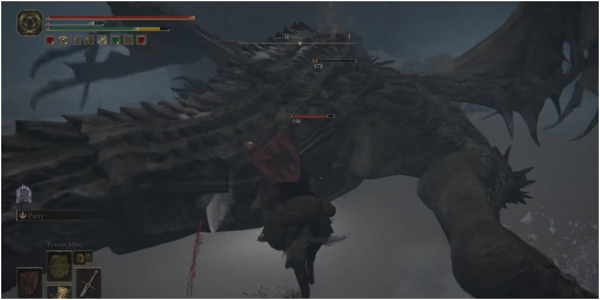 The player using a melee weapon to attack the boss.