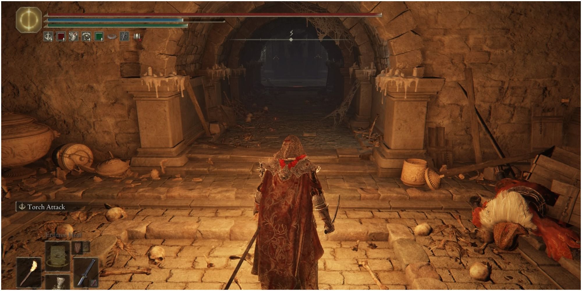 The player approaching the lift through the passageway.
