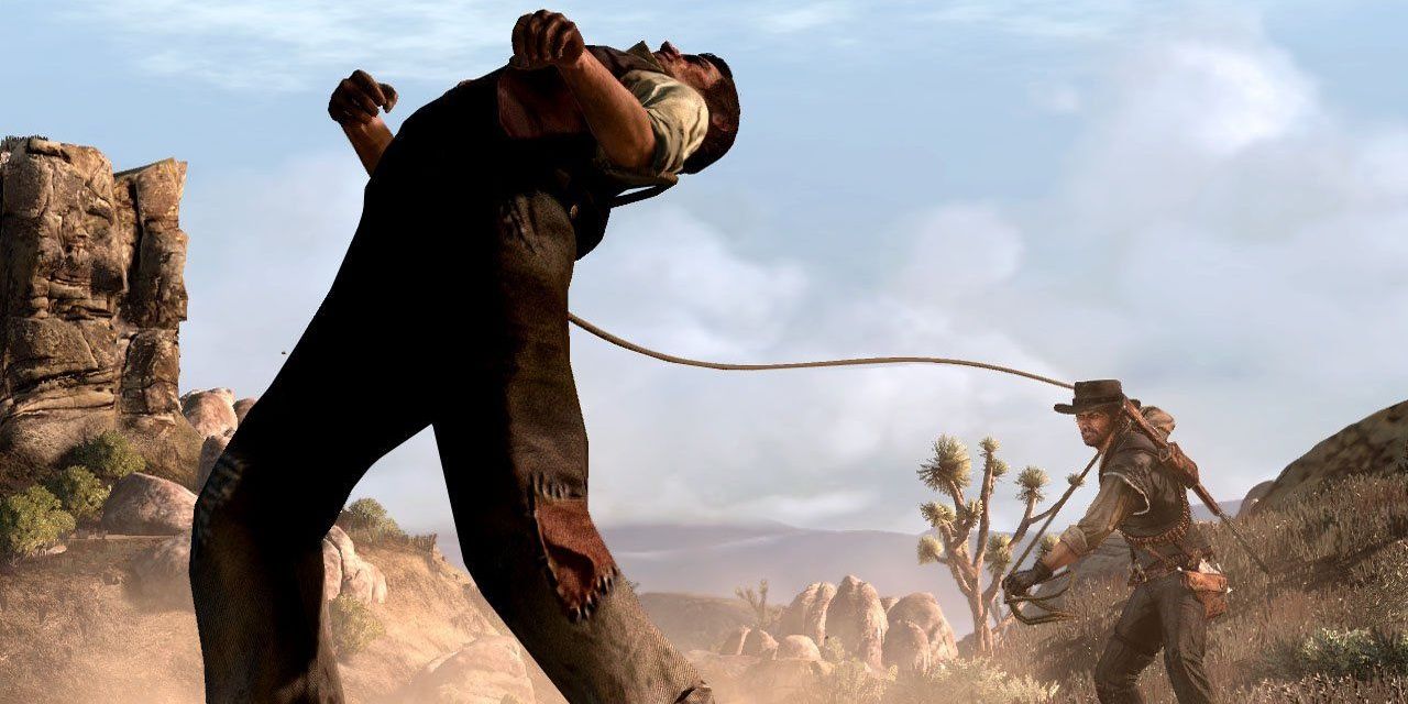 A screenshot showing John Marston capturing an outlaw in Red Dead Redemption