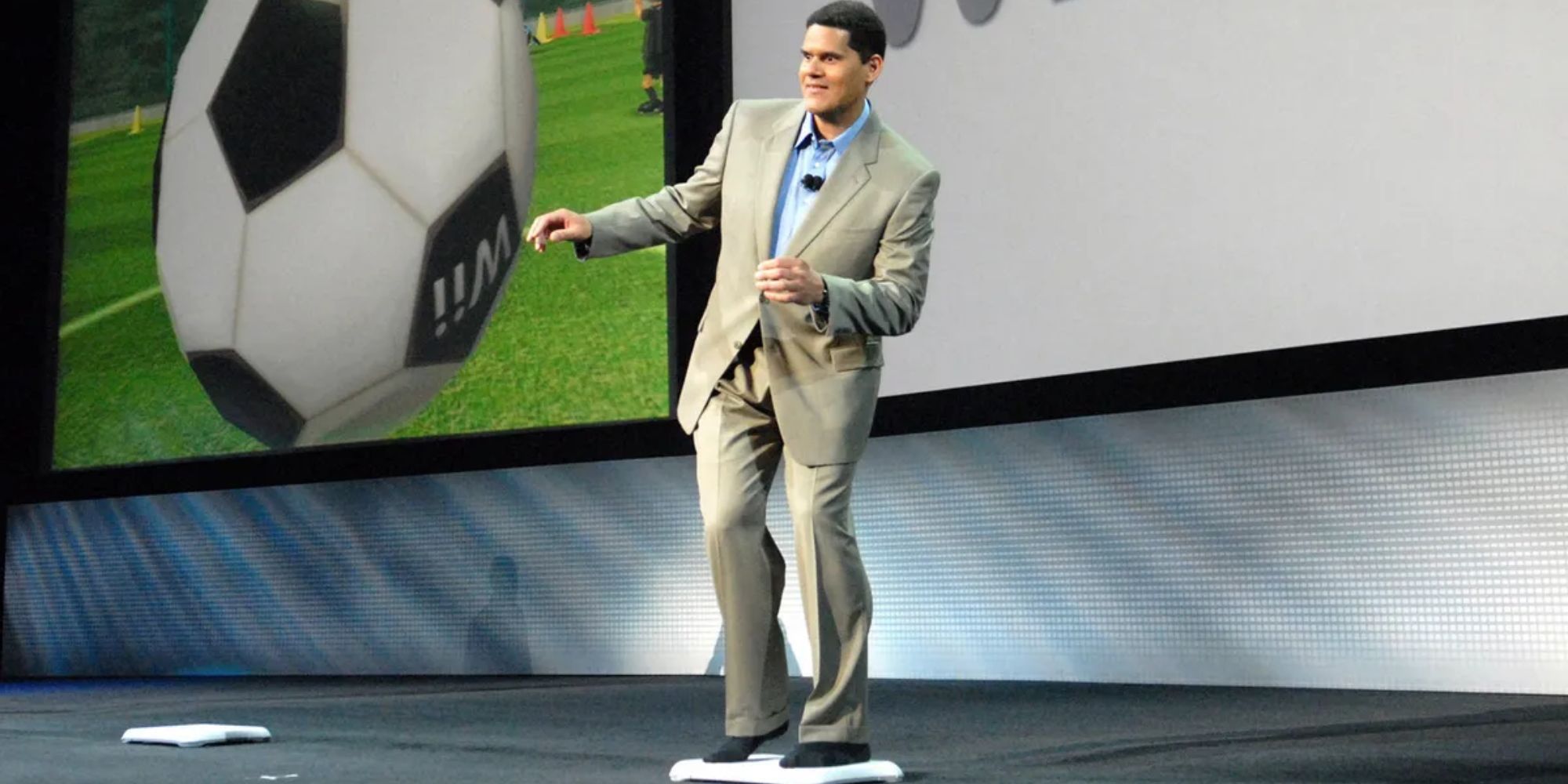 Reggie Fils-Aime on a Wii Balance Board