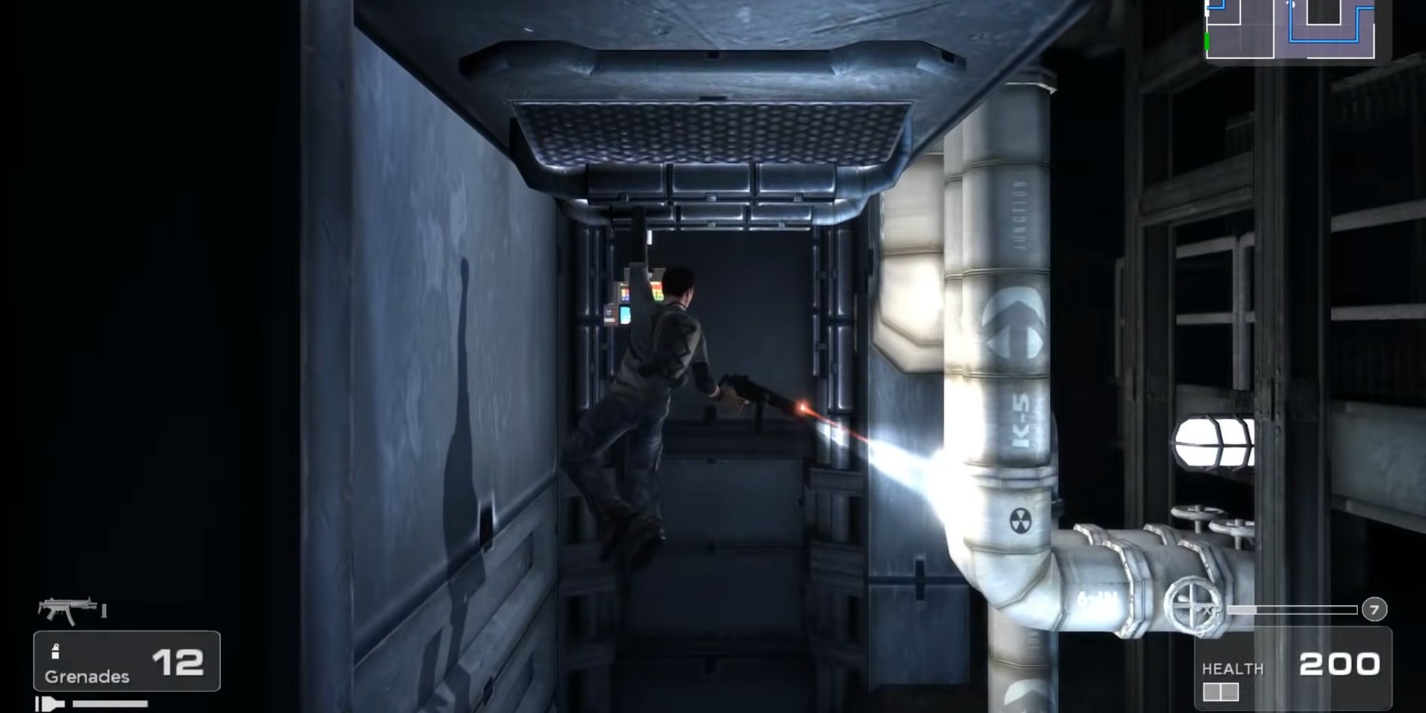 A screenshot from Shadow Complex, showing Jason dangling beneath an elevator