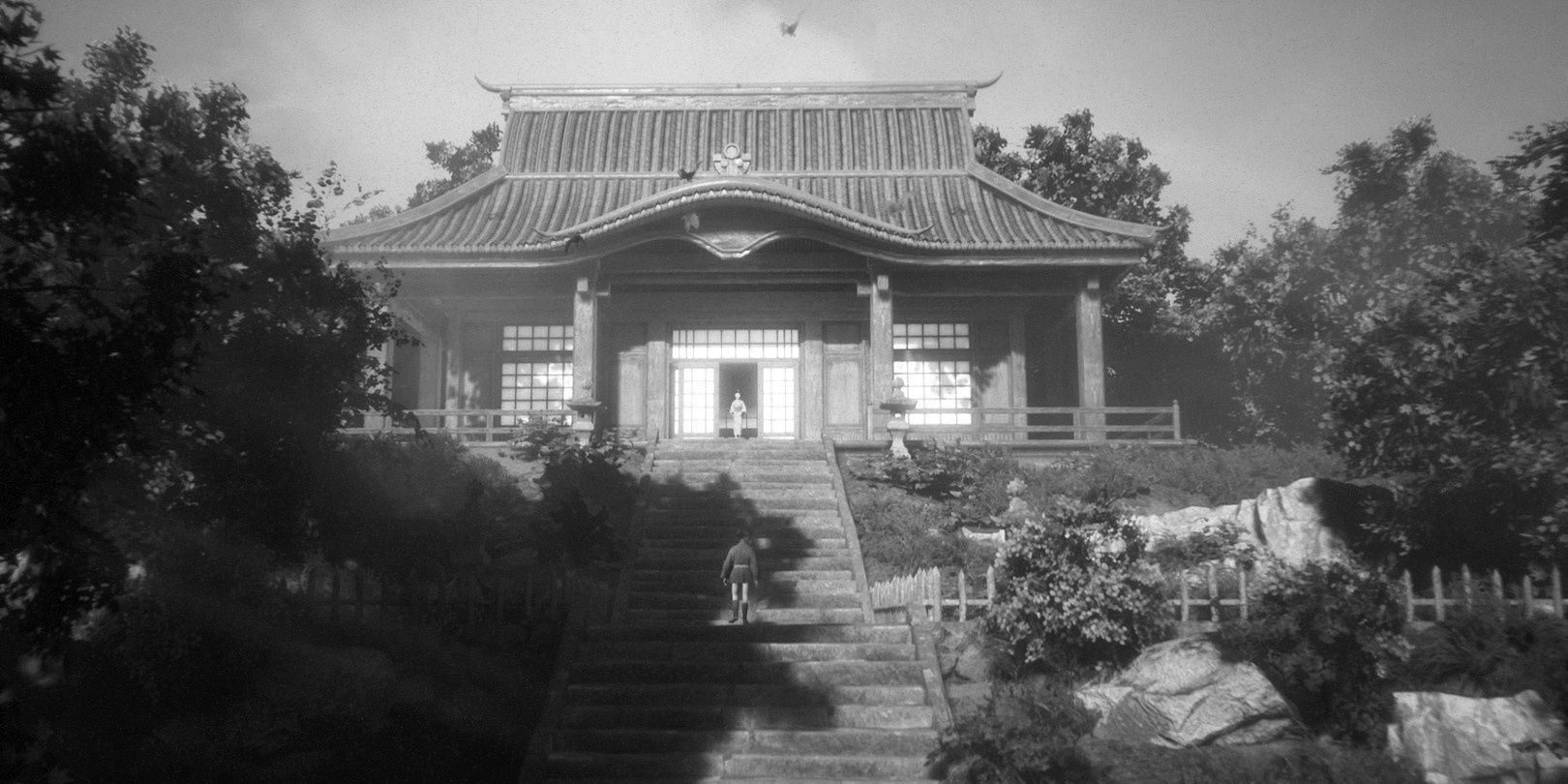 A screenshot showing a young Hiroki standing on the steps leading to the dojo in Trek to Yomi