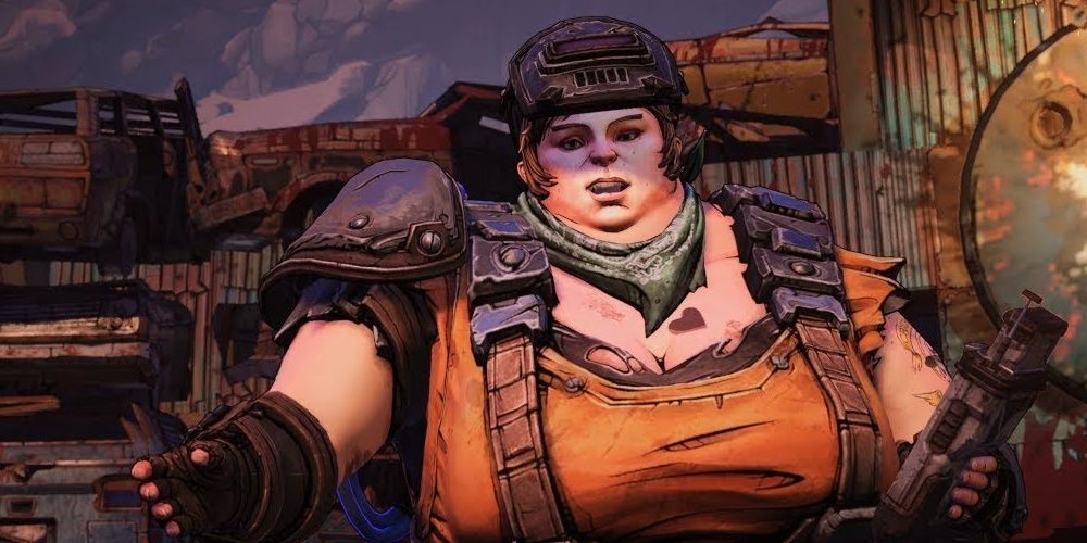 Screenshot of Ellie in Borderlands 3 with a mechanical object in her hand.