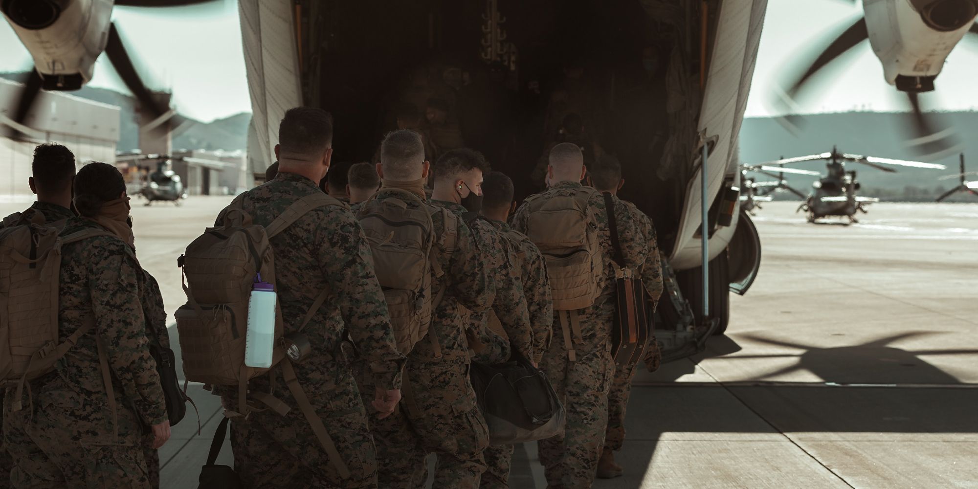 Image of US military boarding an aircraft