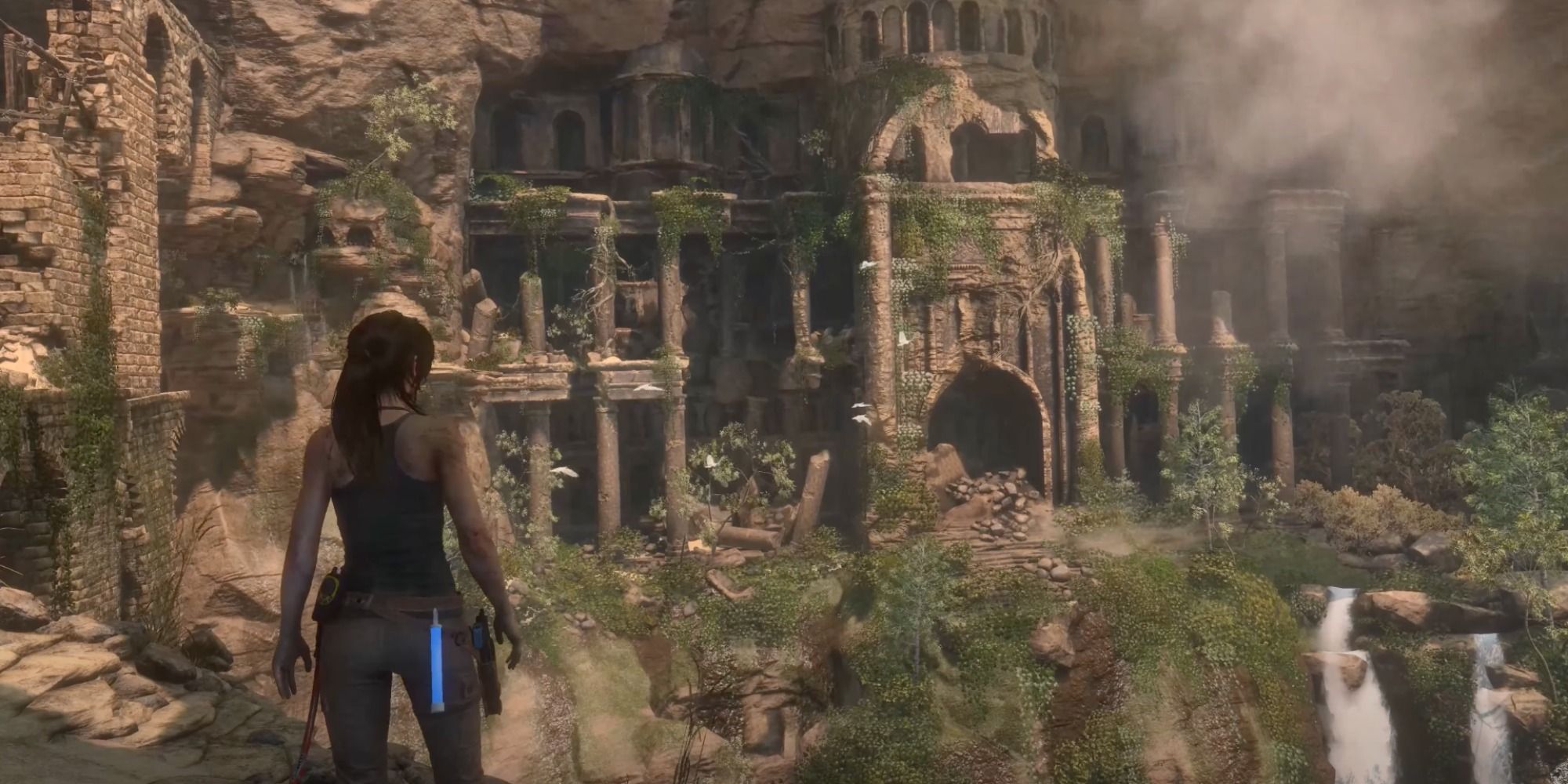 Lara Croft uncovering ruins in Syria in Rise of the Tomb Raider