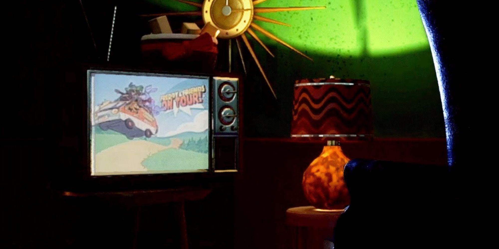 The TV in the secret room, showing the Freddy and Friends on Tour cartoon