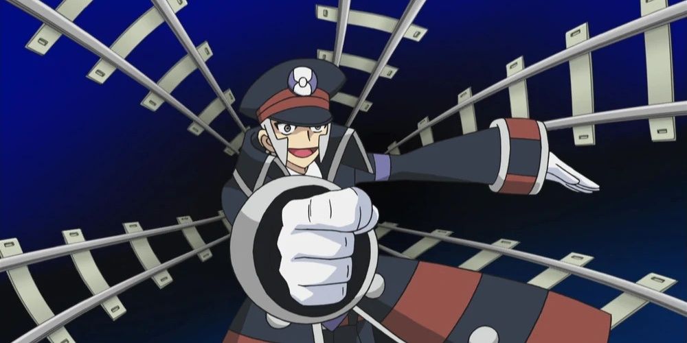 Screenshot of Ingo pointing forwards with train tracks in the background from the Pokemon Black and White anime.