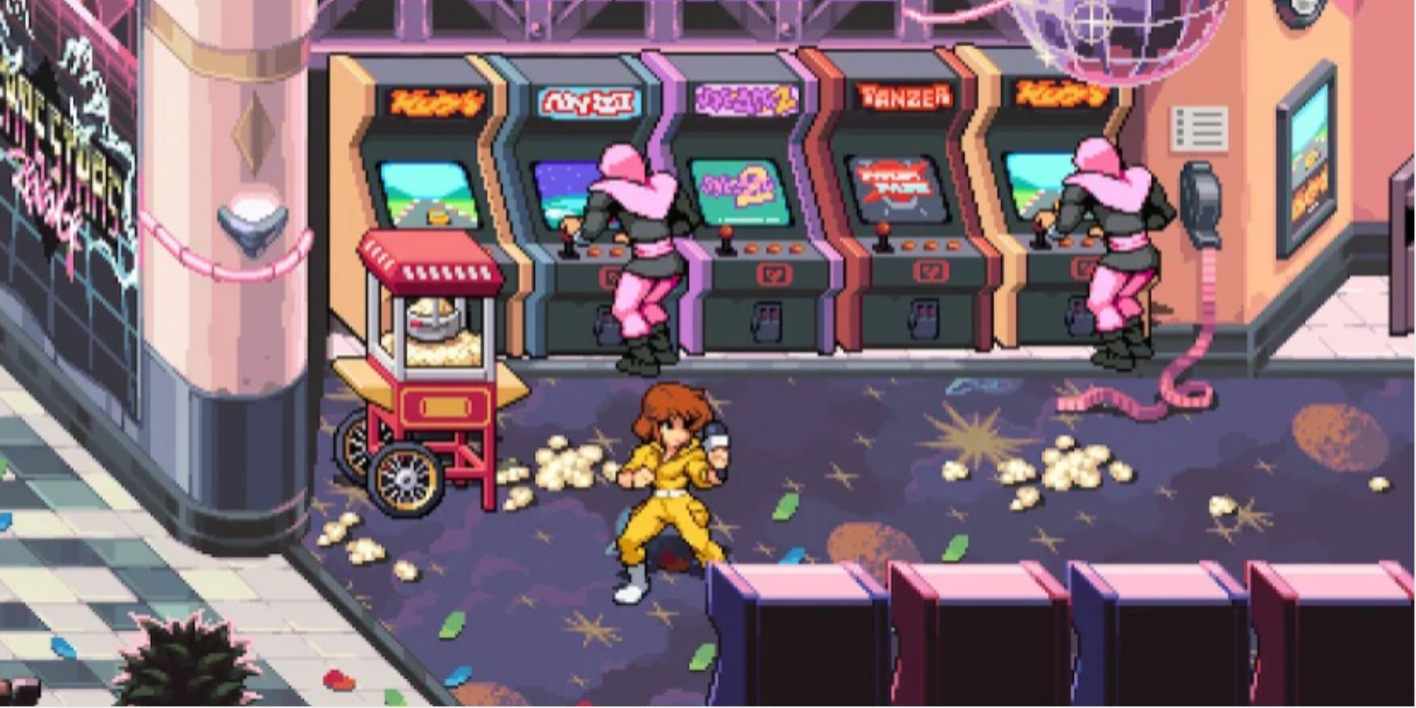 April standing in an Arcade beside a popcorn machine and a couple of Foot Ninjas playing on Arcade Cabinets in Teenage Mutant Ninja Turtles: Shredder's Revenge