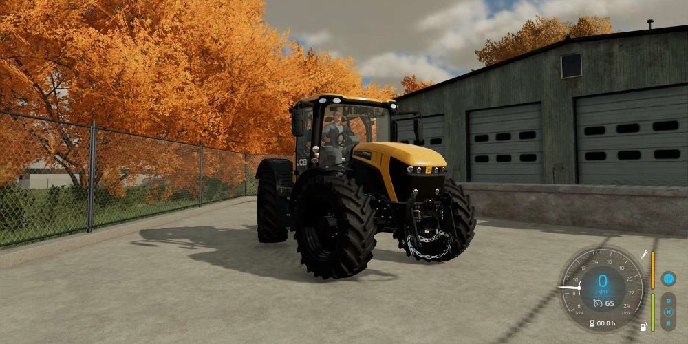 Farming Simulator 22 JCB Fastrac 4220 sitting in front of a storage building