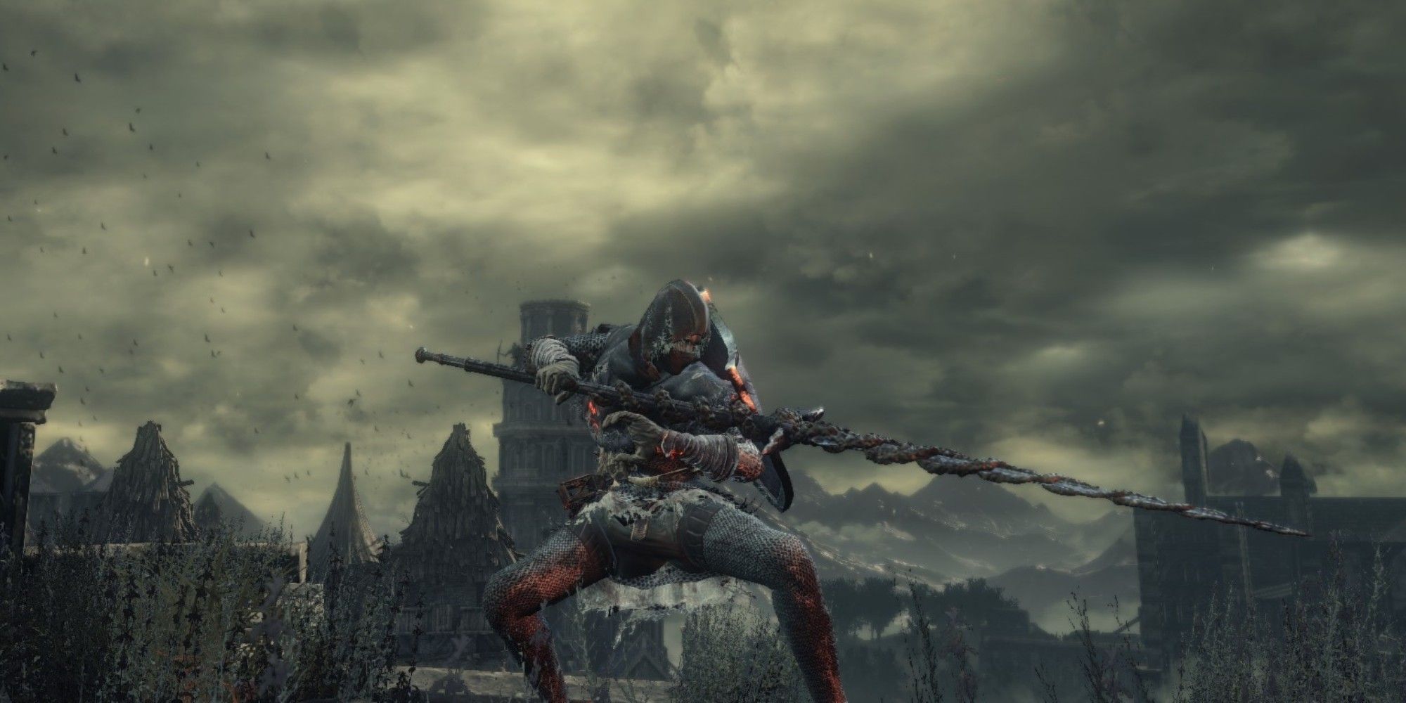 A player character posed with Arstor's Spear weapon Dark Souls 3