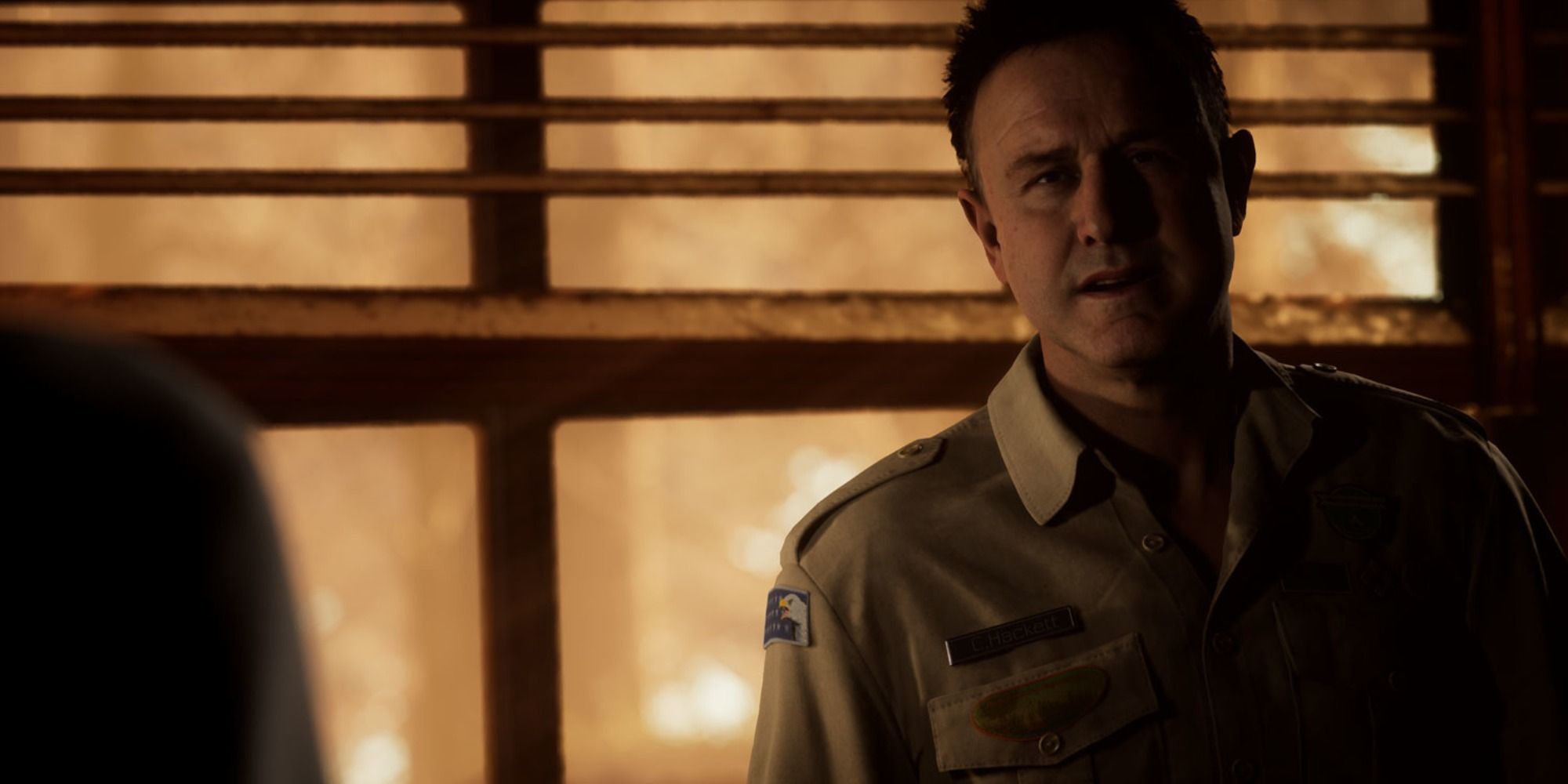 A screenshot showing a scene in The Quarry with David Arquette as Chris.