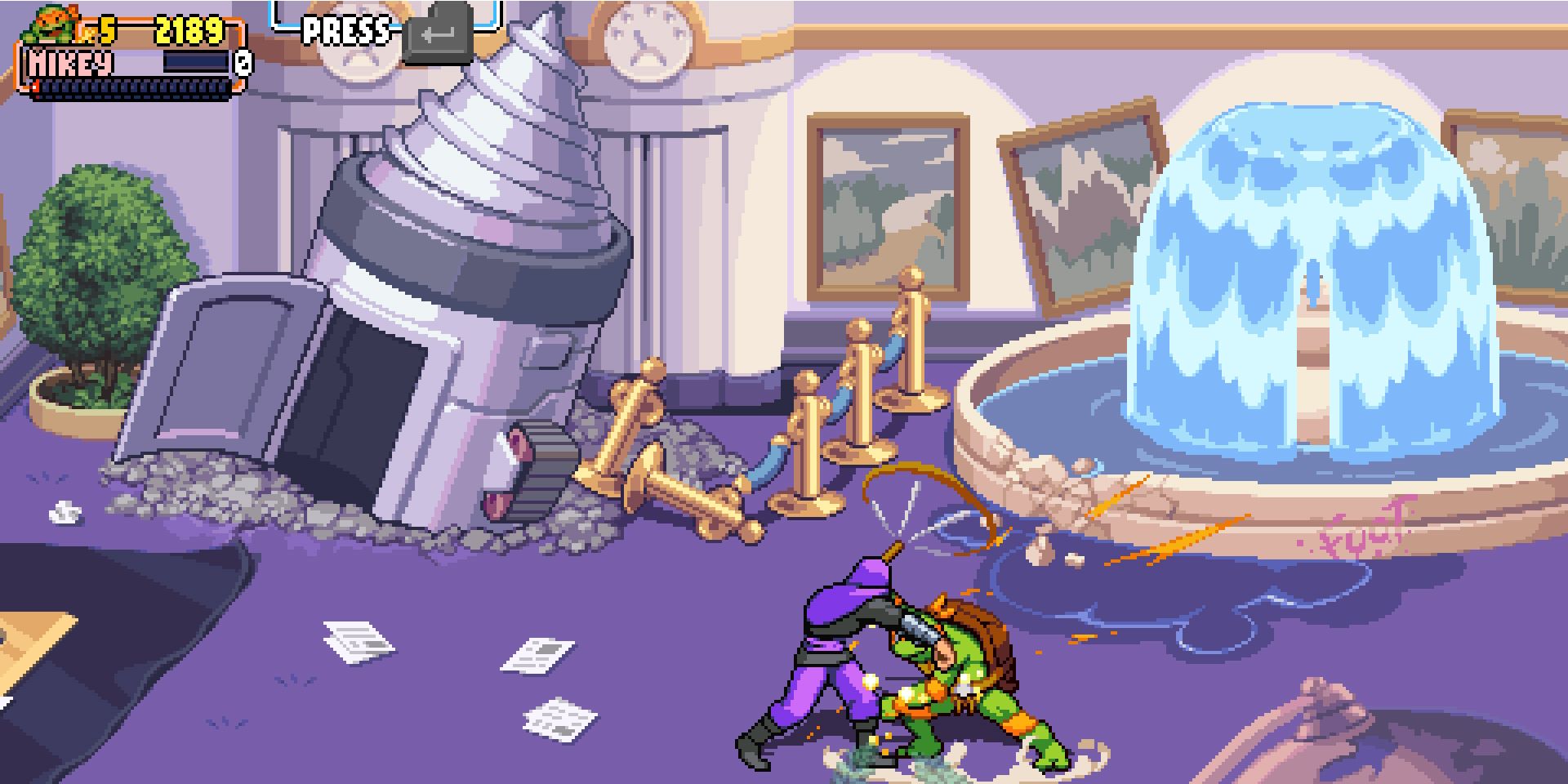 A screenshot showing Michaelangelo not getting knocked back by an enemy strike during a charged attack in Teenage Mutant Ninja Turtles: Shredder's Revenge
