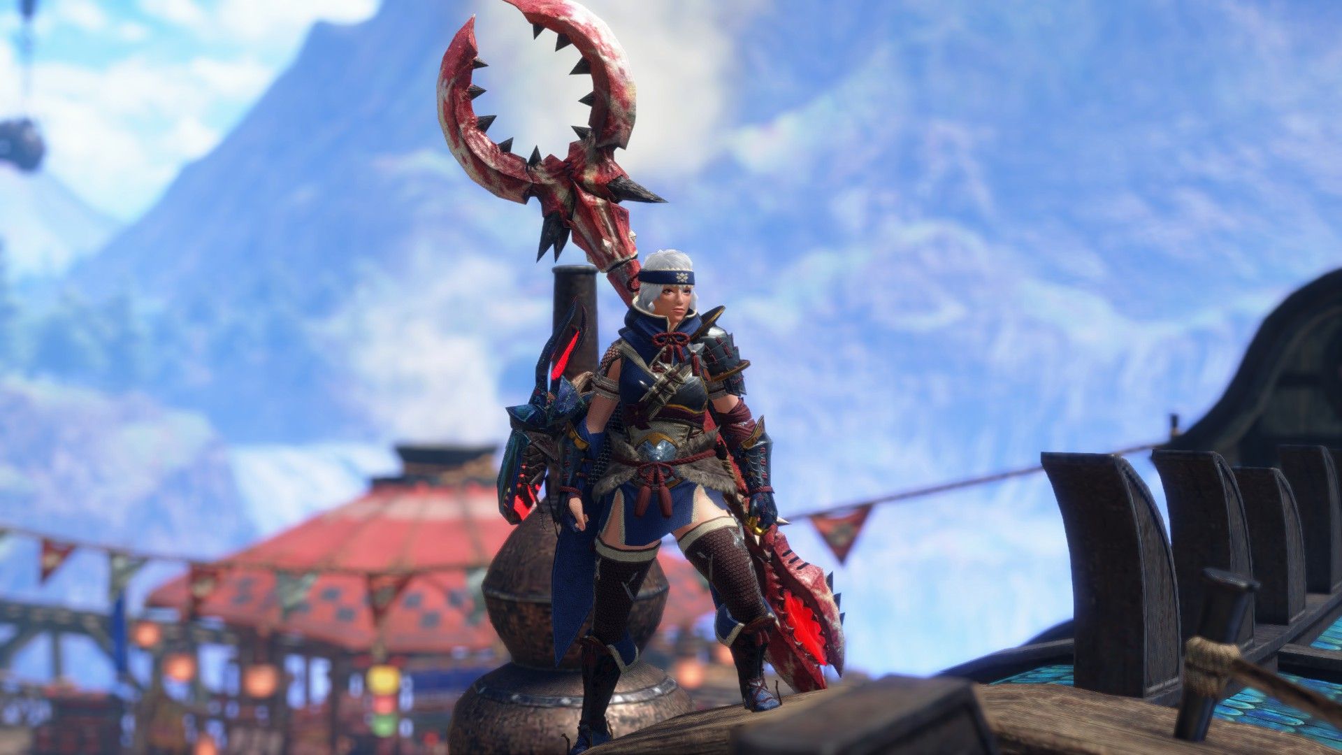 A hunter wearing Kamura Legacy armor with the Shell Intoner Insect Glaive.