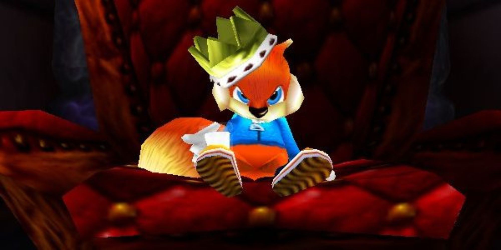 Conker sits on a big red chair with a crown on his head.