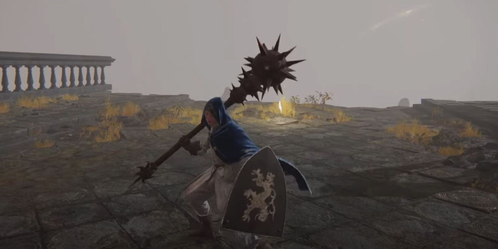 Elden Ring Character holding the Great Stars weapon while crouched on a stone path