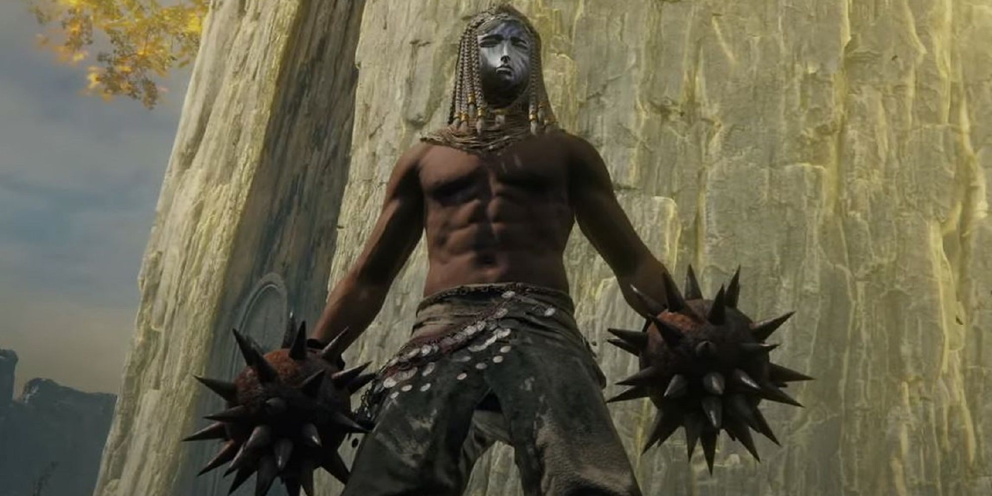 Elden Ring Character wearing a mask with a Star Fist weapon on each hand
