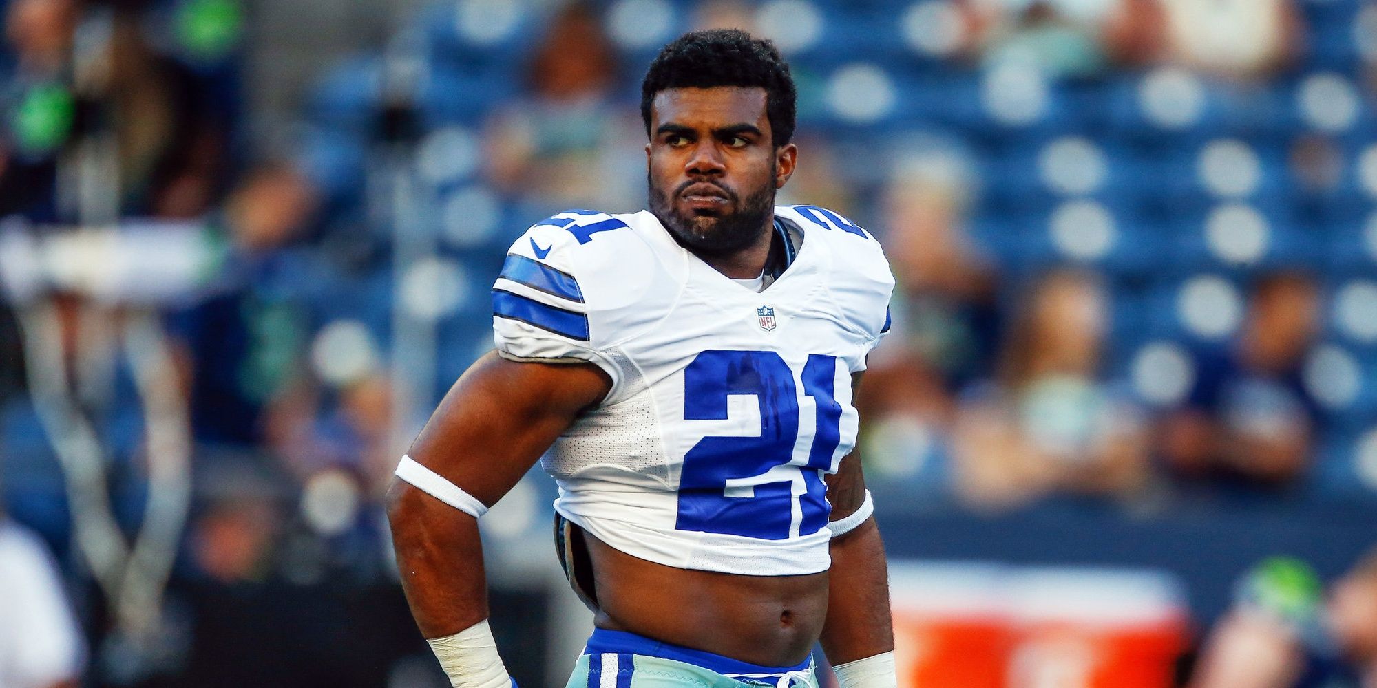 Ezekiel Elliott in crop top white Cowboys jersey