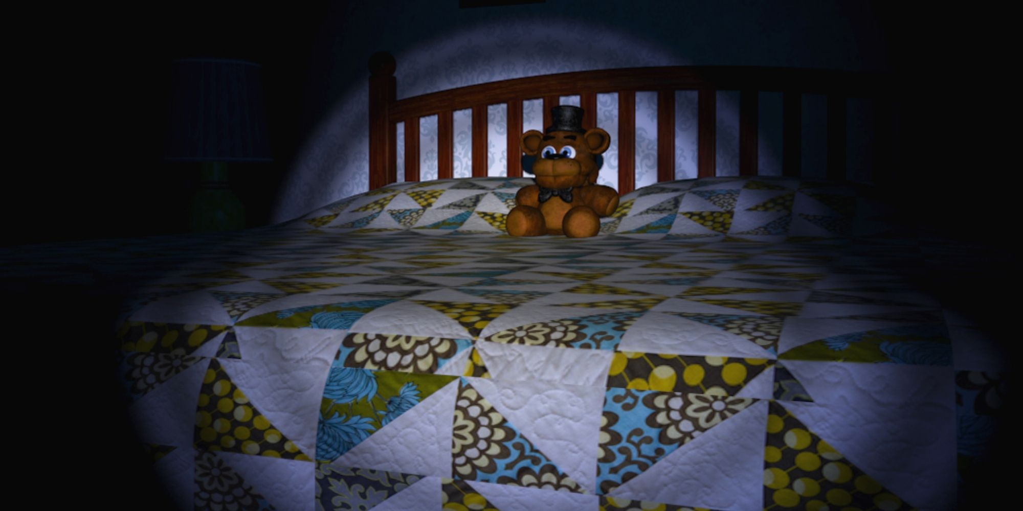 A bed lit by a flashlight with a Freddy plush sitting in the middle.