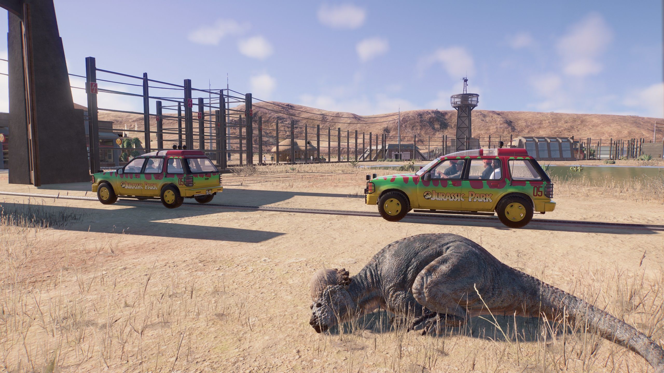 A Driving Tour Goes Past A Sleeping Dinosaur