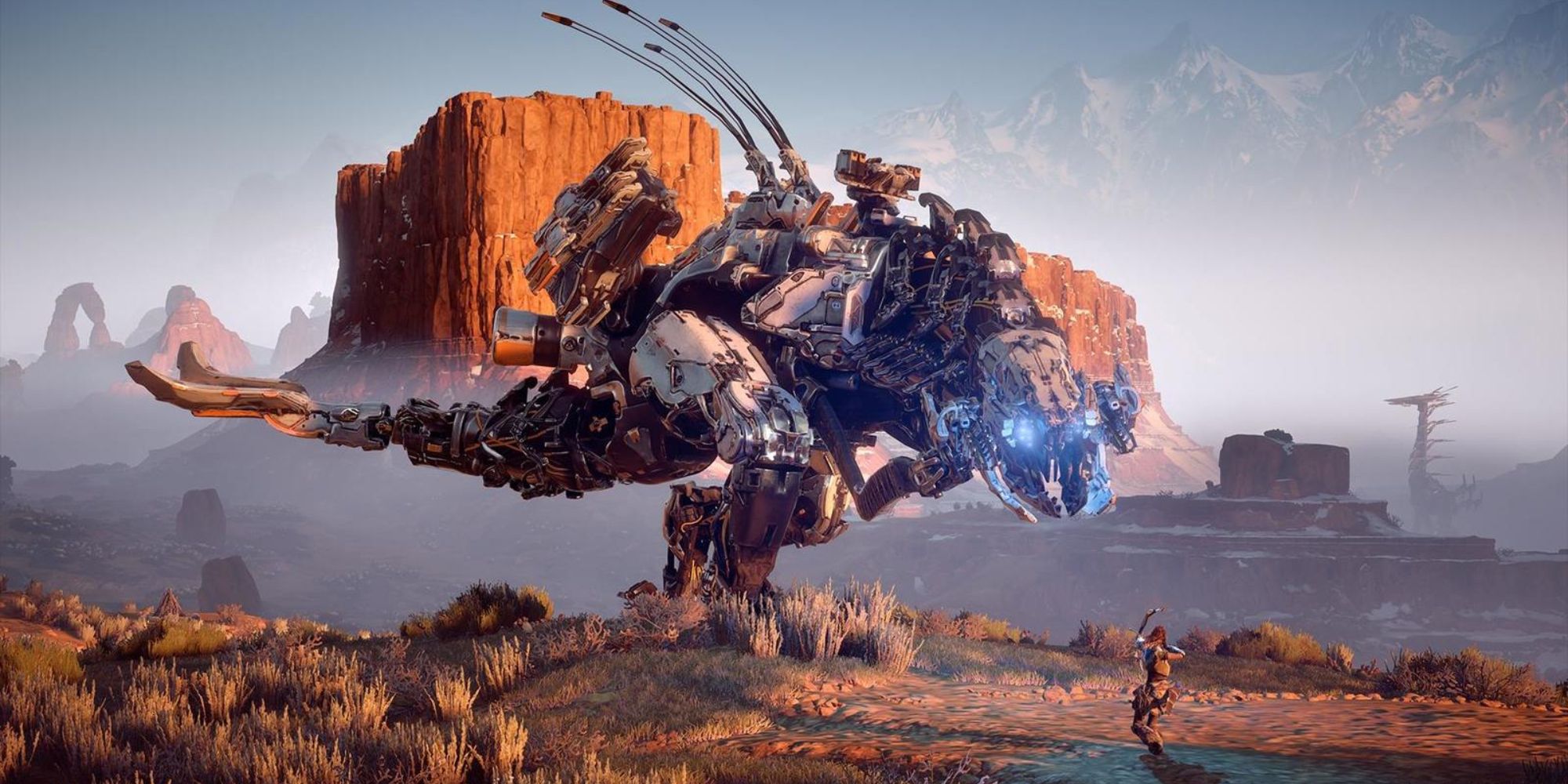 an extreme wide shot of a Thunderjaw from Horizon Forbidden West towering over Aloy who is aiming her bow at it