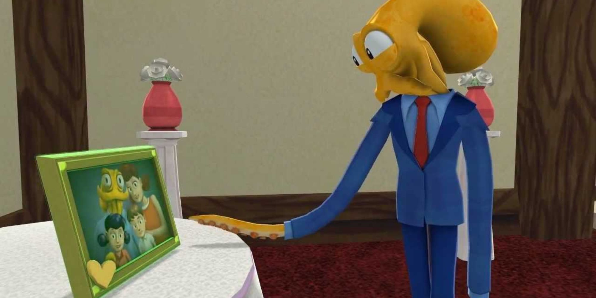 Octodad looking lovingly at a picture of his family in Octodad Dadliest Catch