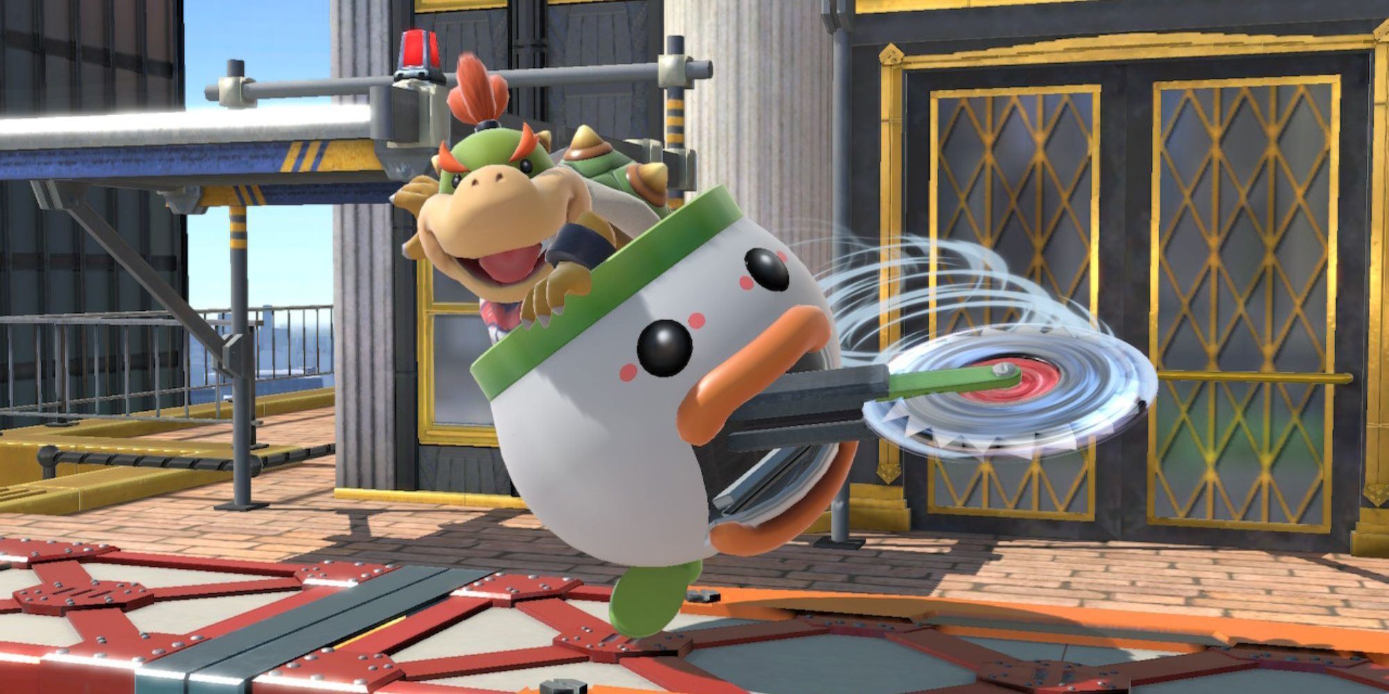 Bowser Jr. uses his buzzsaw attack on the Super Mario Odyssey stage