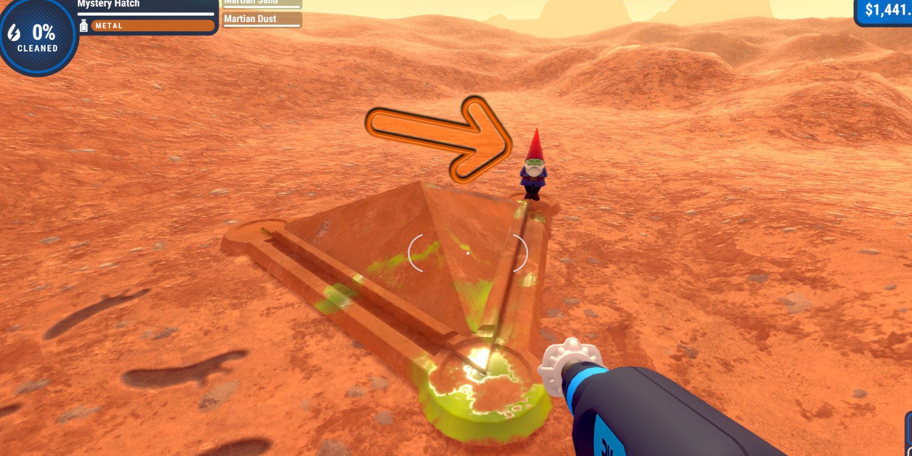 A green garden gnome standing next to a hatch on Mars, highlighted by an arrow.