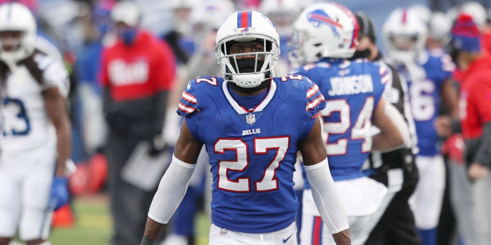 Tre'Davious White staring at the camera from afar in blue Bills uniform