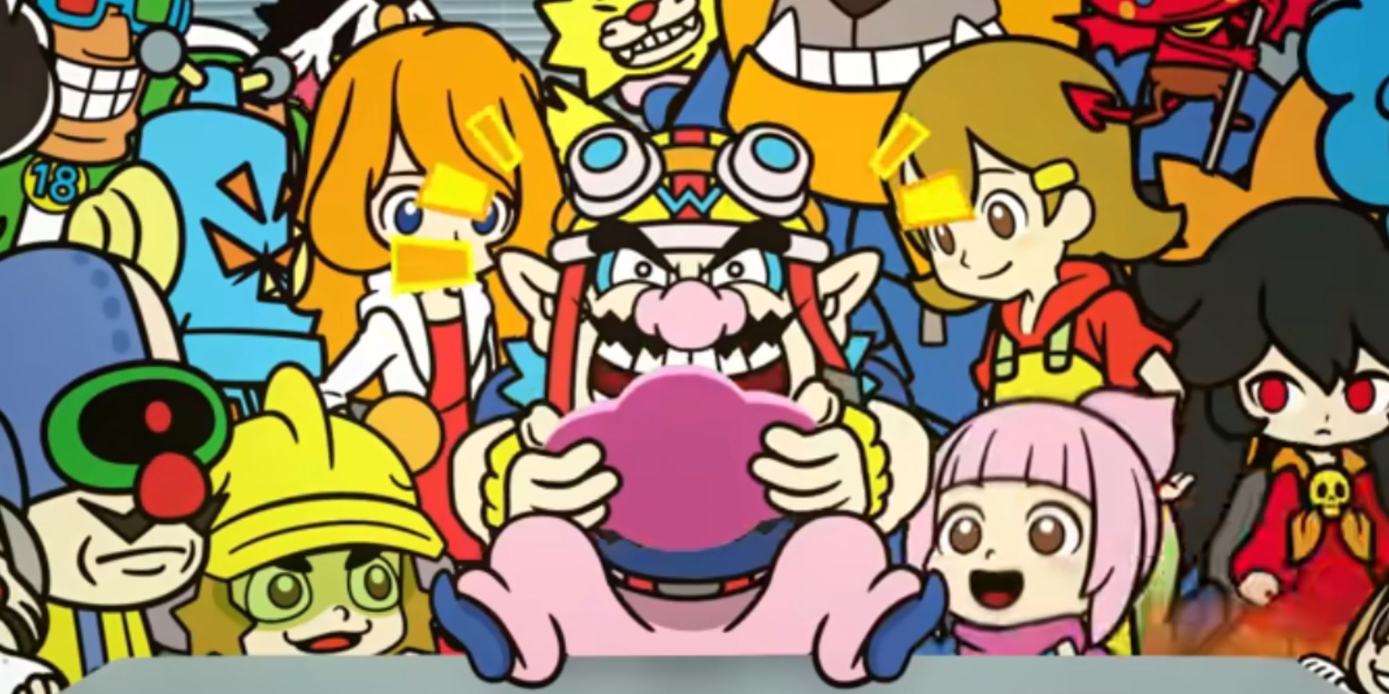 Wario sits at a table playing a handheld console surrounded by his friends