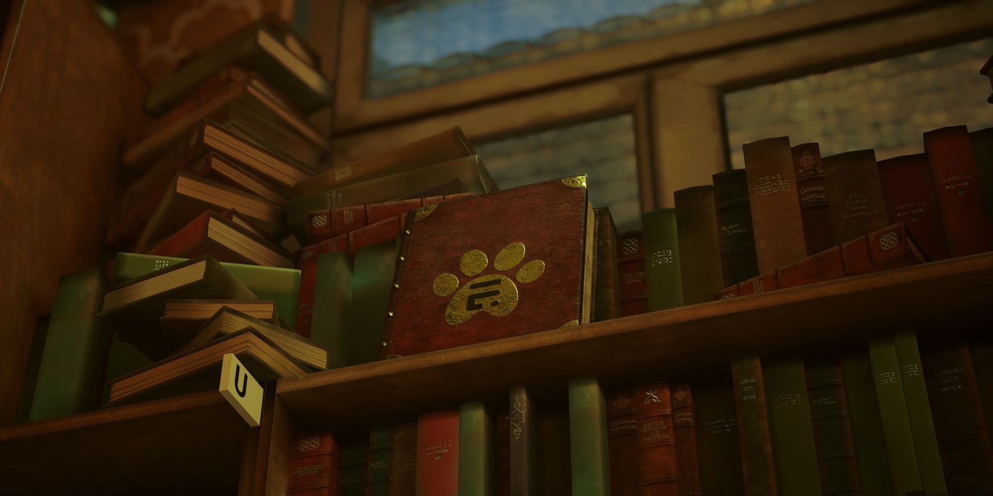 a journal with a paw print embossed on the cover sits on the bookshelf