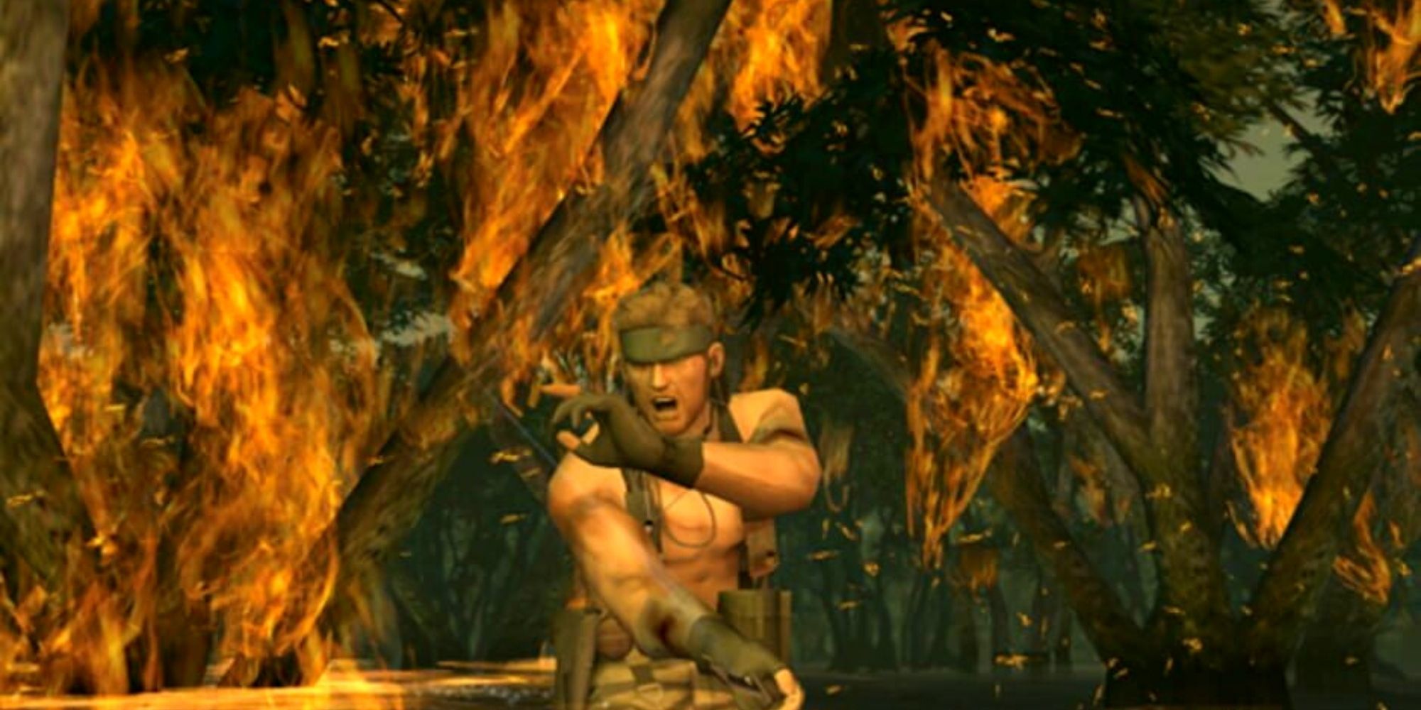Naked Snake in a fighting stance in front of burning trees