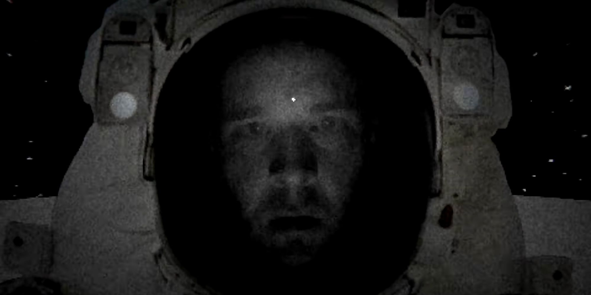 A screenshot of Solipsis, showing the main character's photorealistic face gazing out of their spacesuit in terror