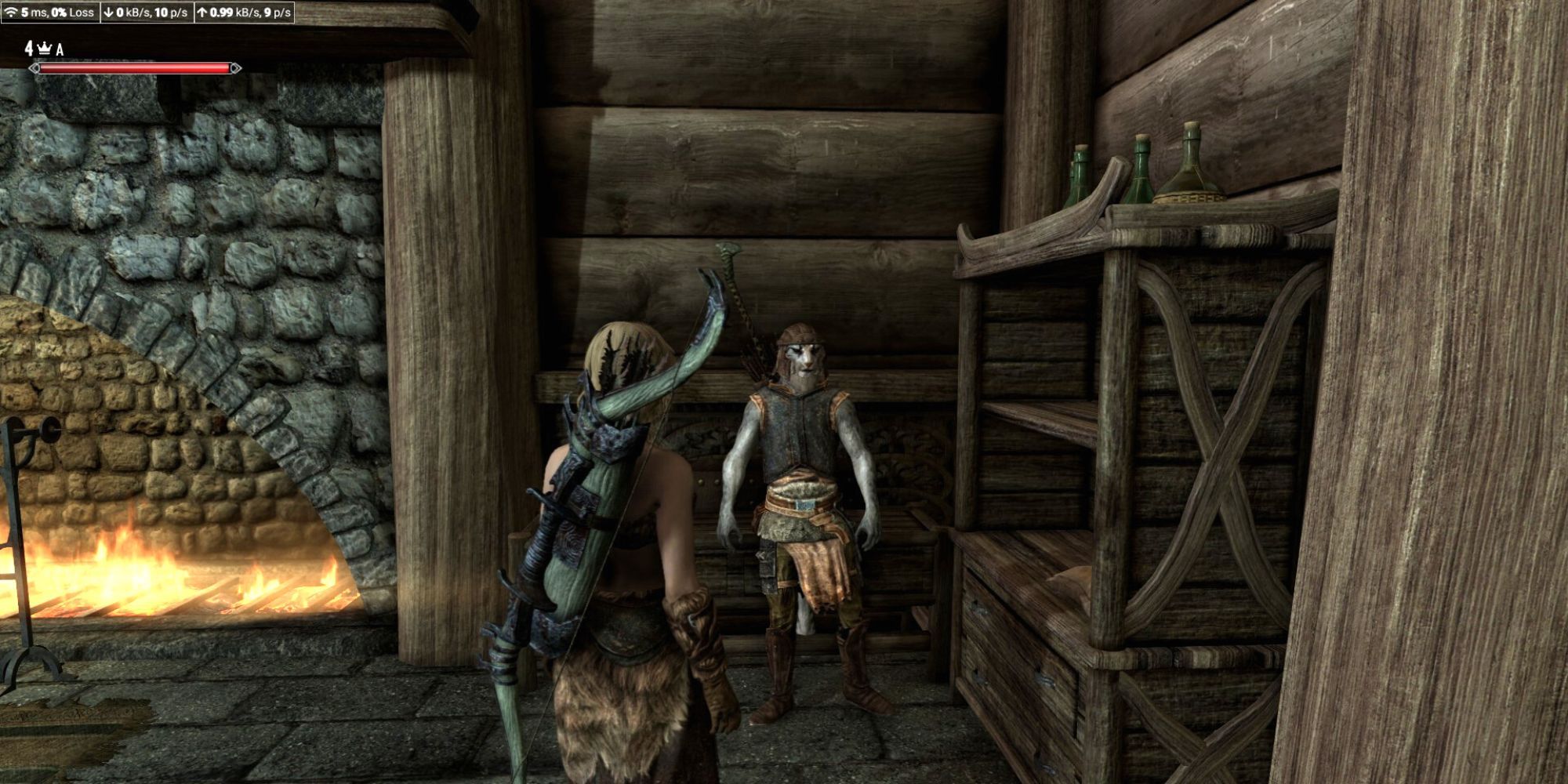 Two party members stand in front of a cabinet in the Keep