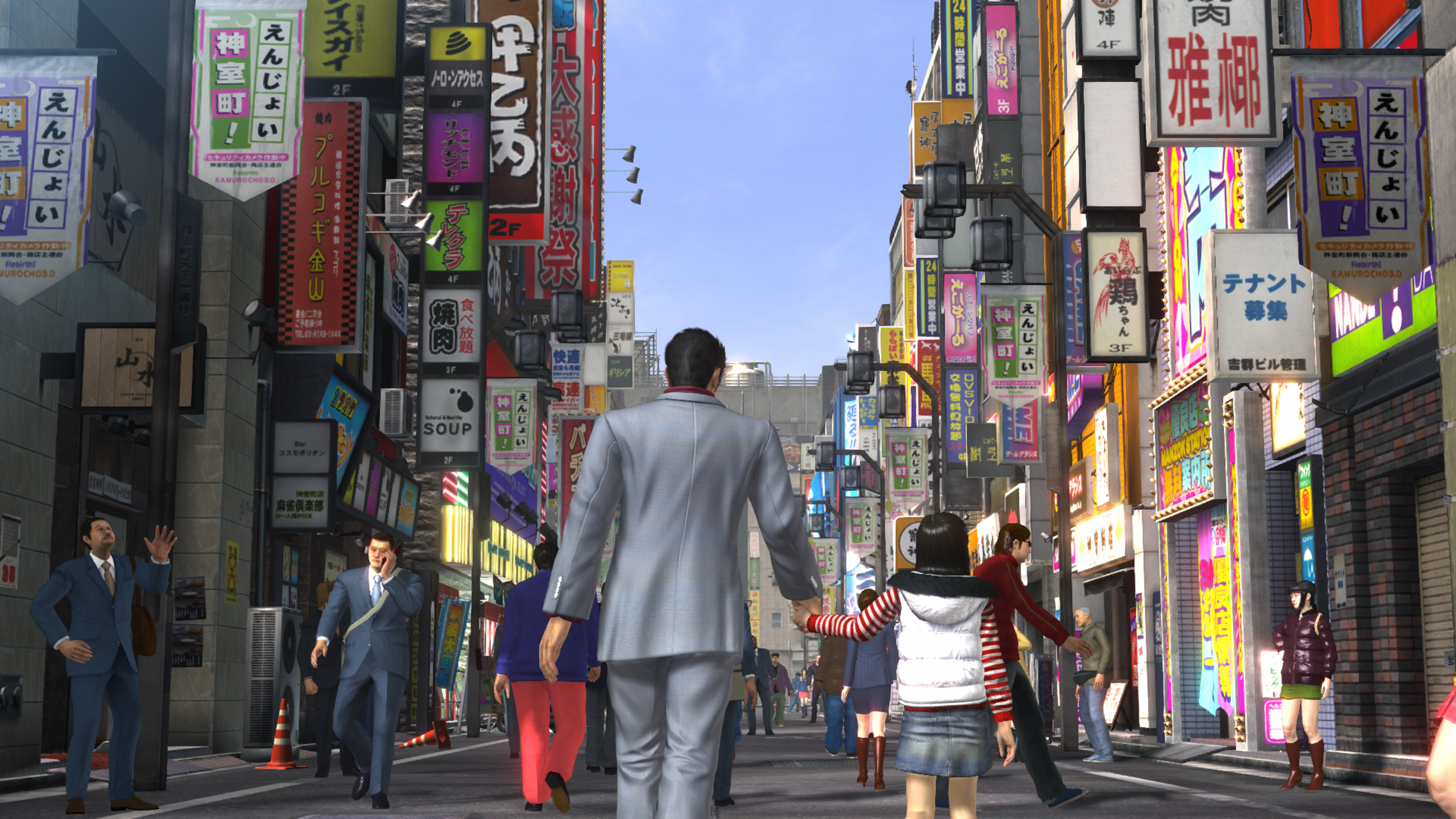 Kiryu walking into Kamurocho with his daughter